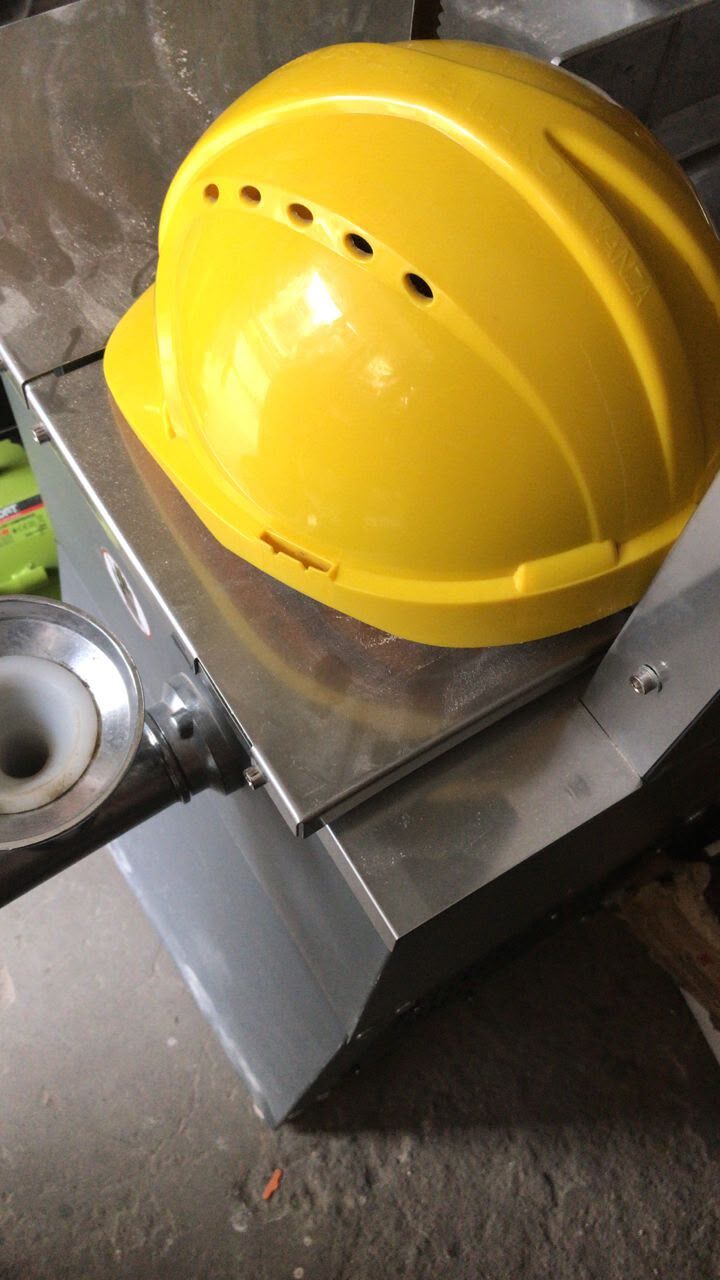 Yellow safety helmet, outer shell